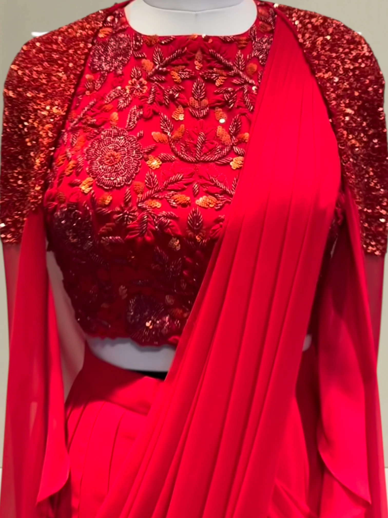 Ruffed cape with drape twist0 product image