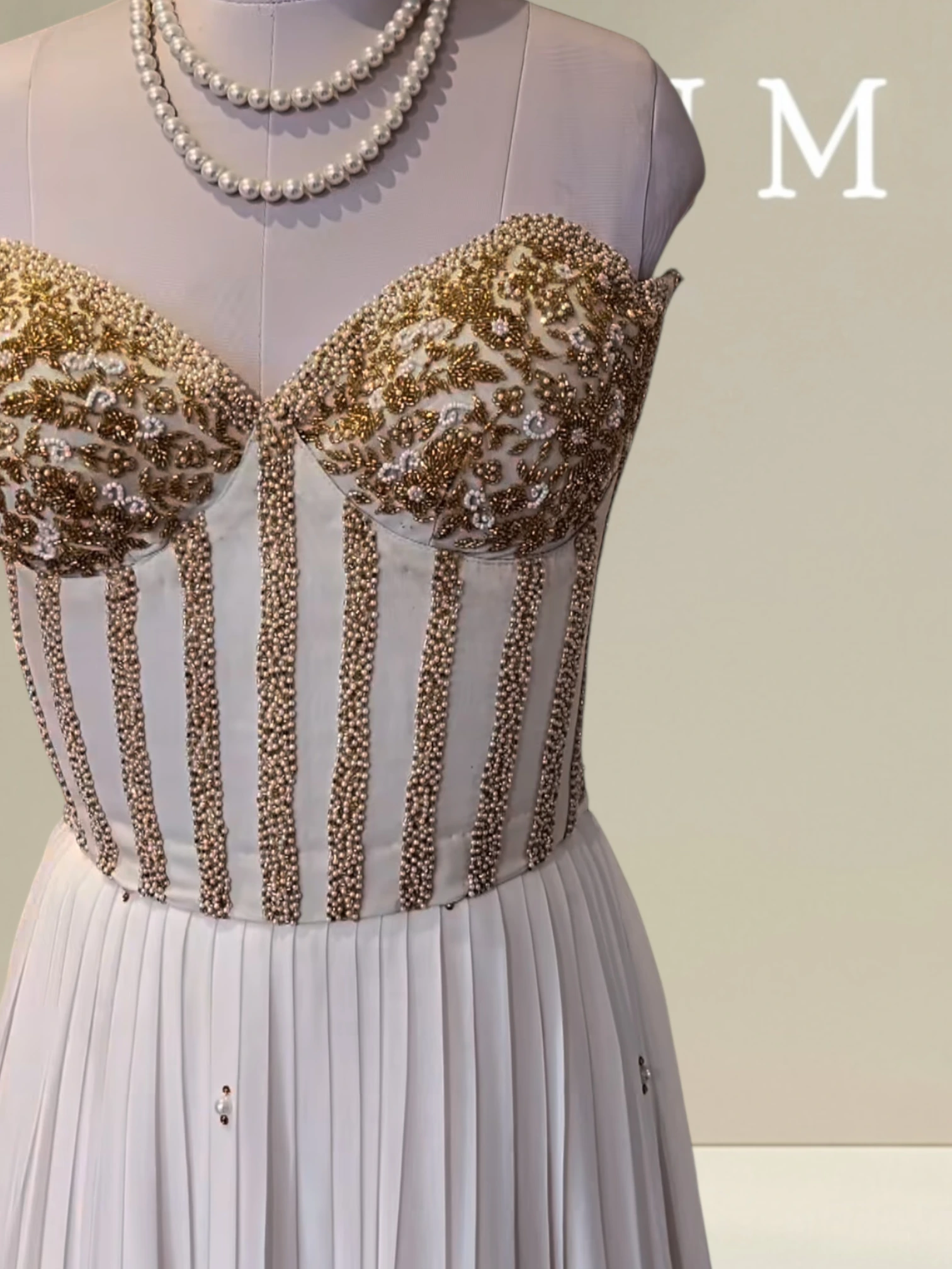 Pleated skirt with stylish corset blouse0 product image