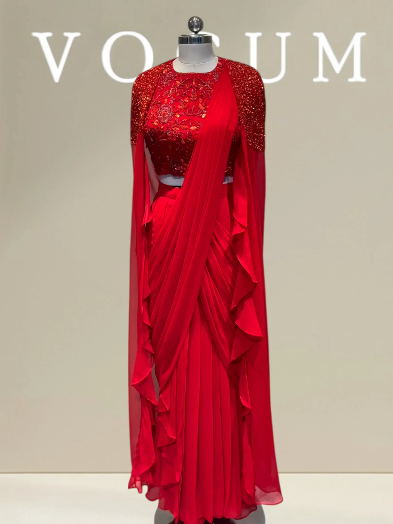 Ruffed cape with drape twist product image